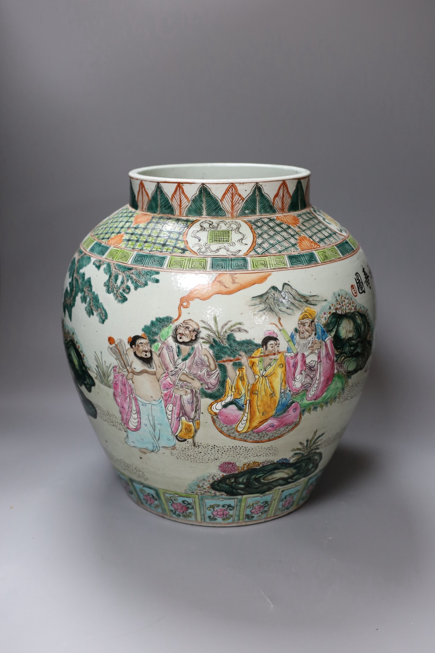 A large Chinese famille rose jar, 39 cms high